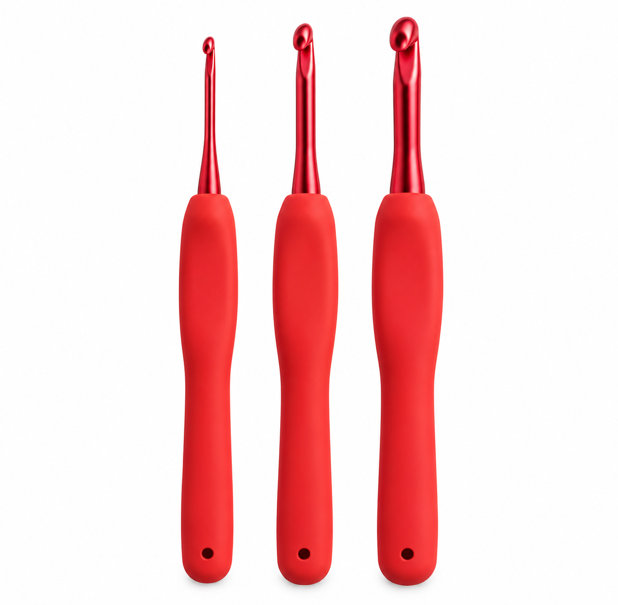 Tres ganchillos rojos ergonómicos sobre fondo blanco, imagen ilustrativa del pack